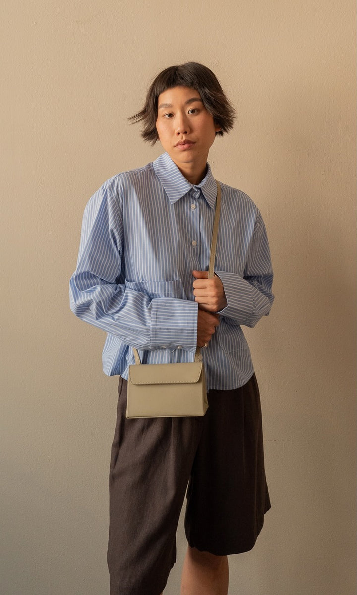 Cropped oversized shirt with patch pockets