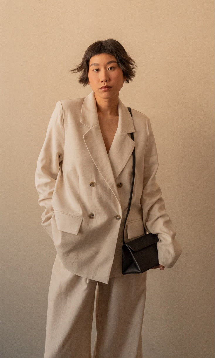 Linen pleated trousers in cream