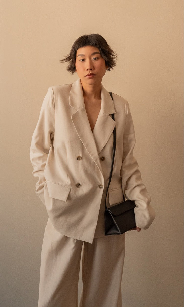 Linen pleated trousers in cream