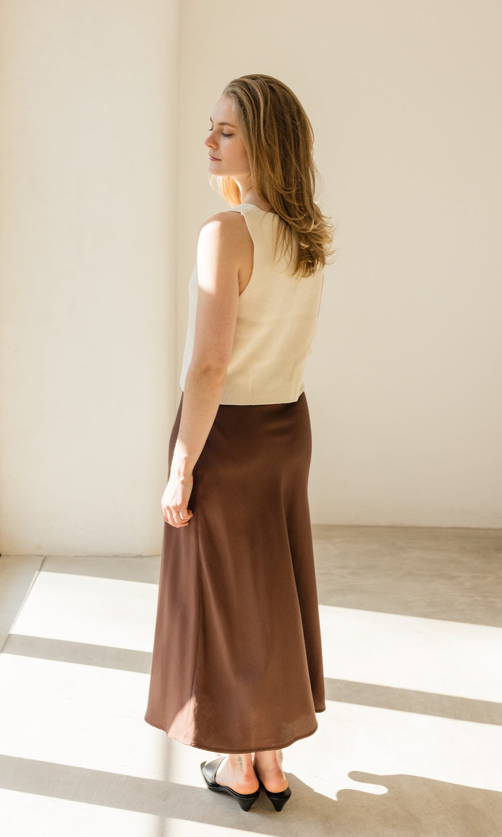 Strickweste mit Schleifendetail aus Bio Baumwolle - abricot coco